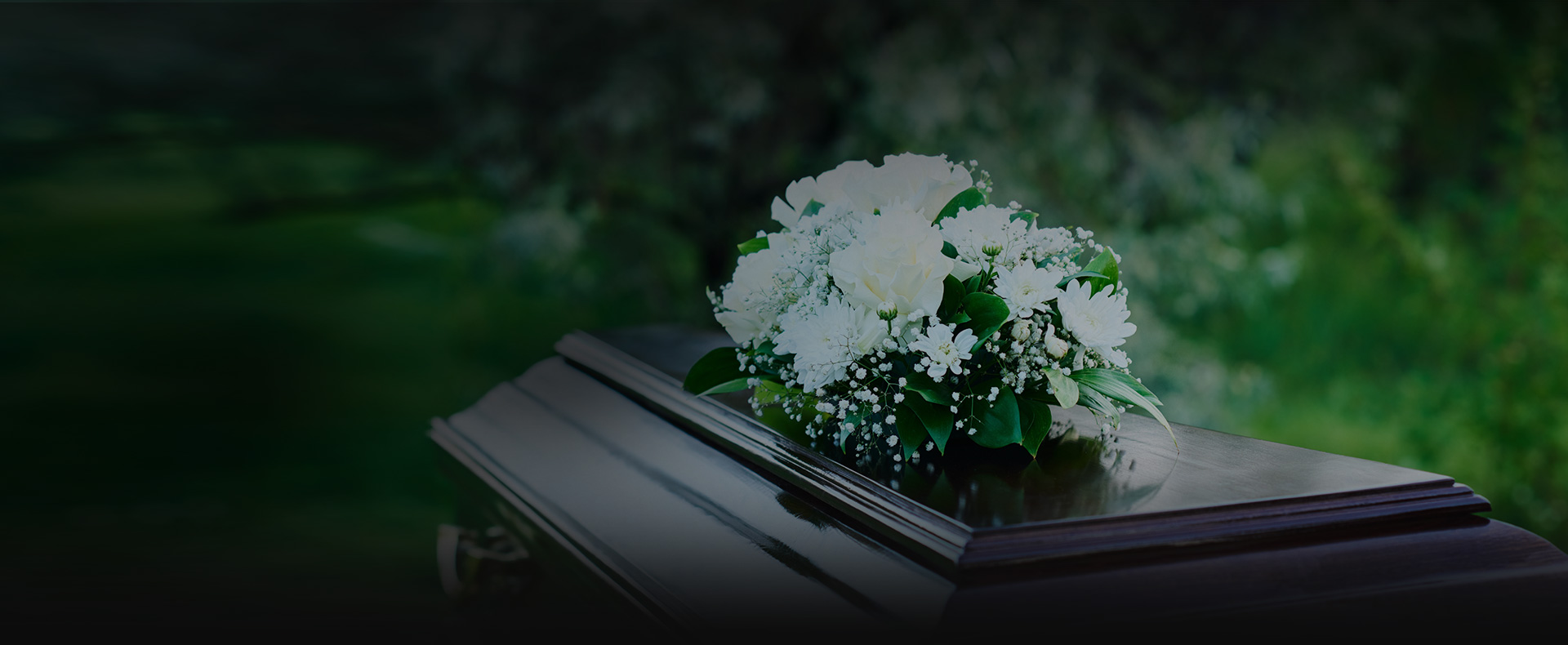 coffin with flowers