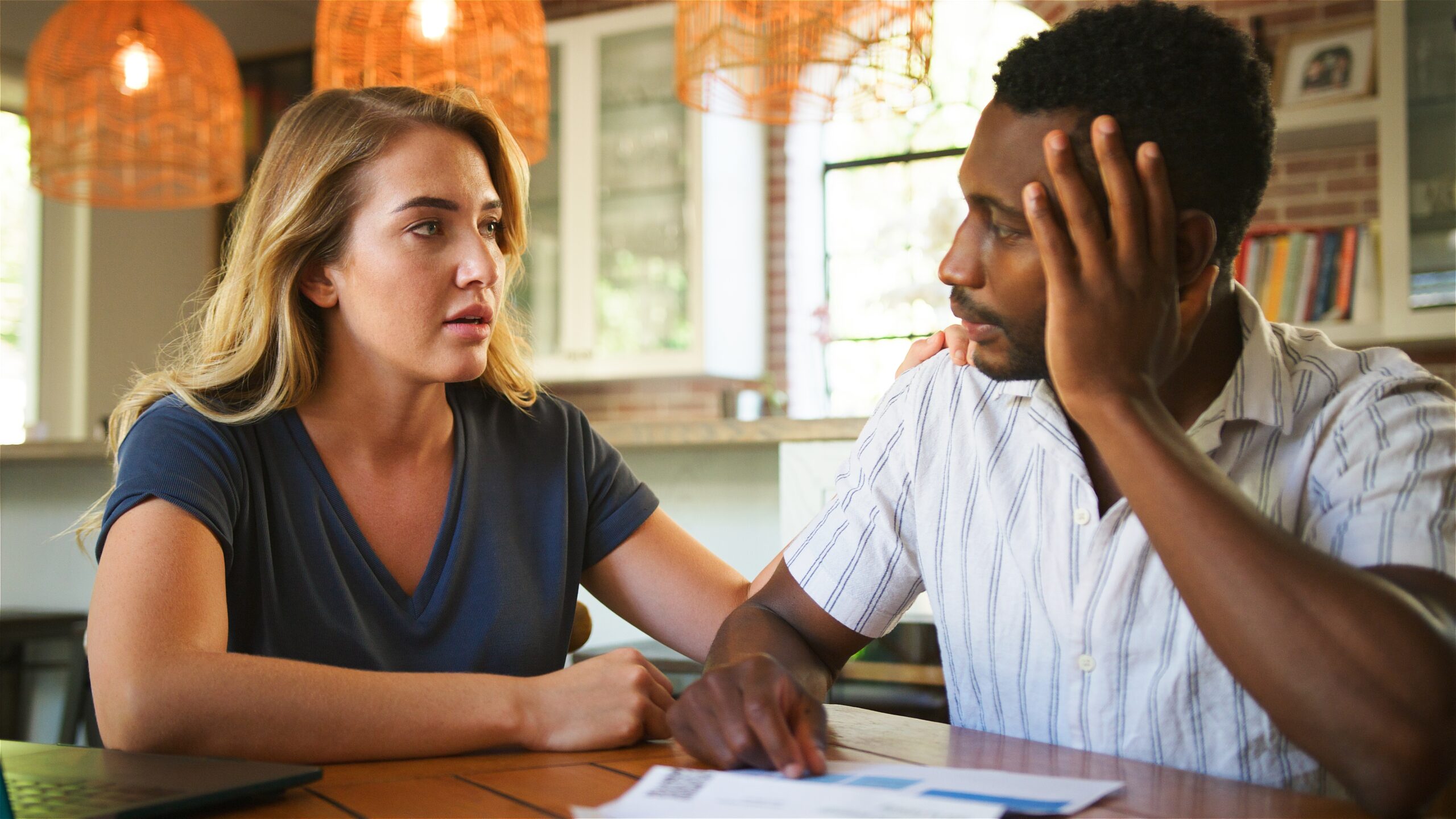Couple Talking At Table
