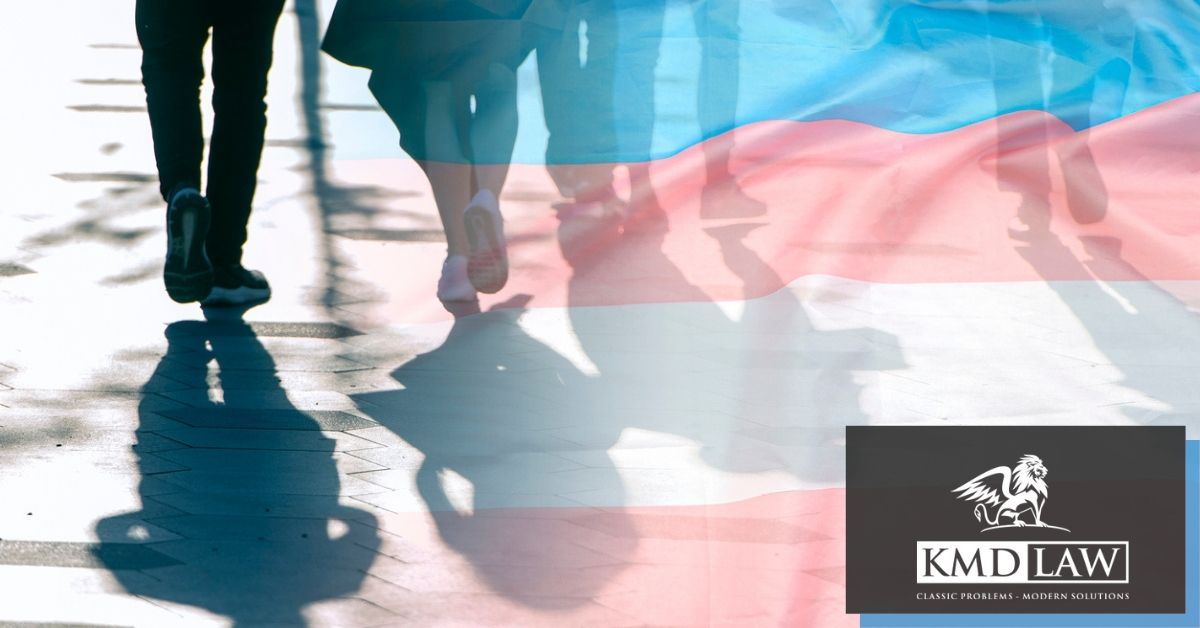 People walking overlaid with flag