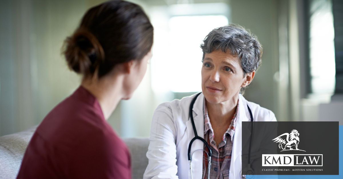 Doctor talking to woman
