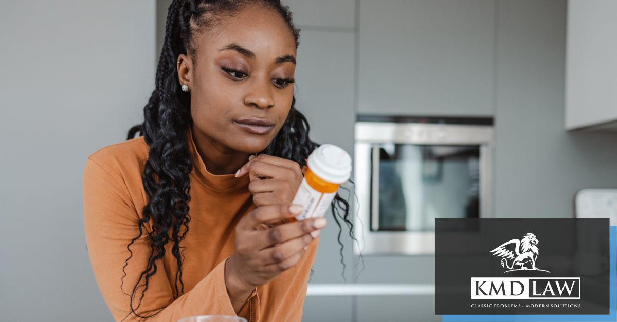 Woman looking at pill bottle