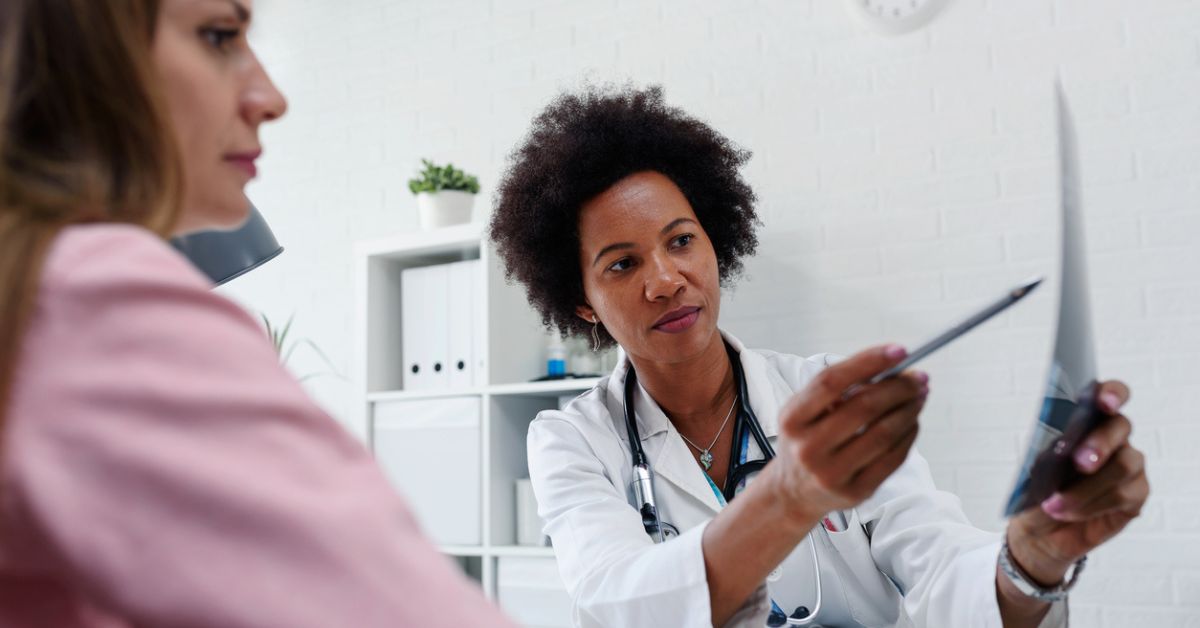 Doctor showing patient a result