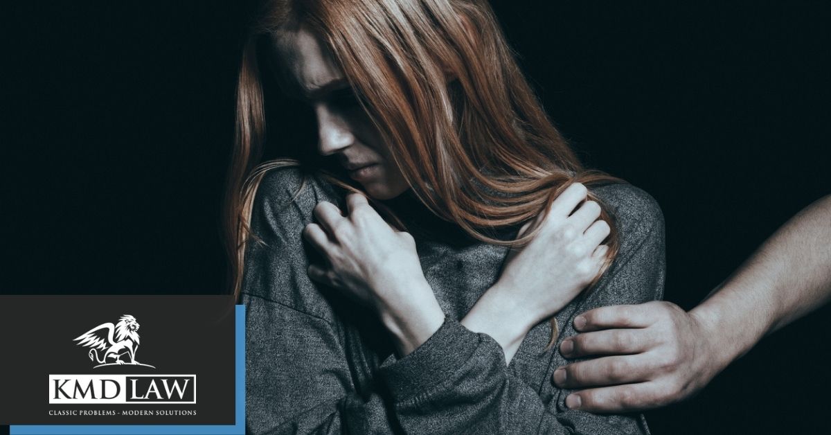 Woman with arms crossed avoiding touch