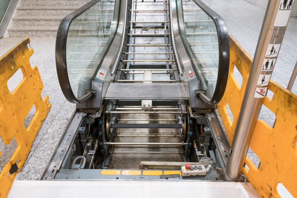 Maintenance work on escalator