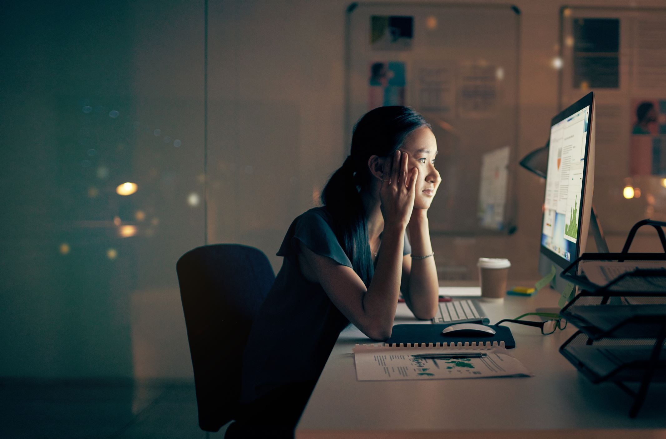 Woman looking at information on a computer
